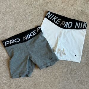 Nike pros: both pairs